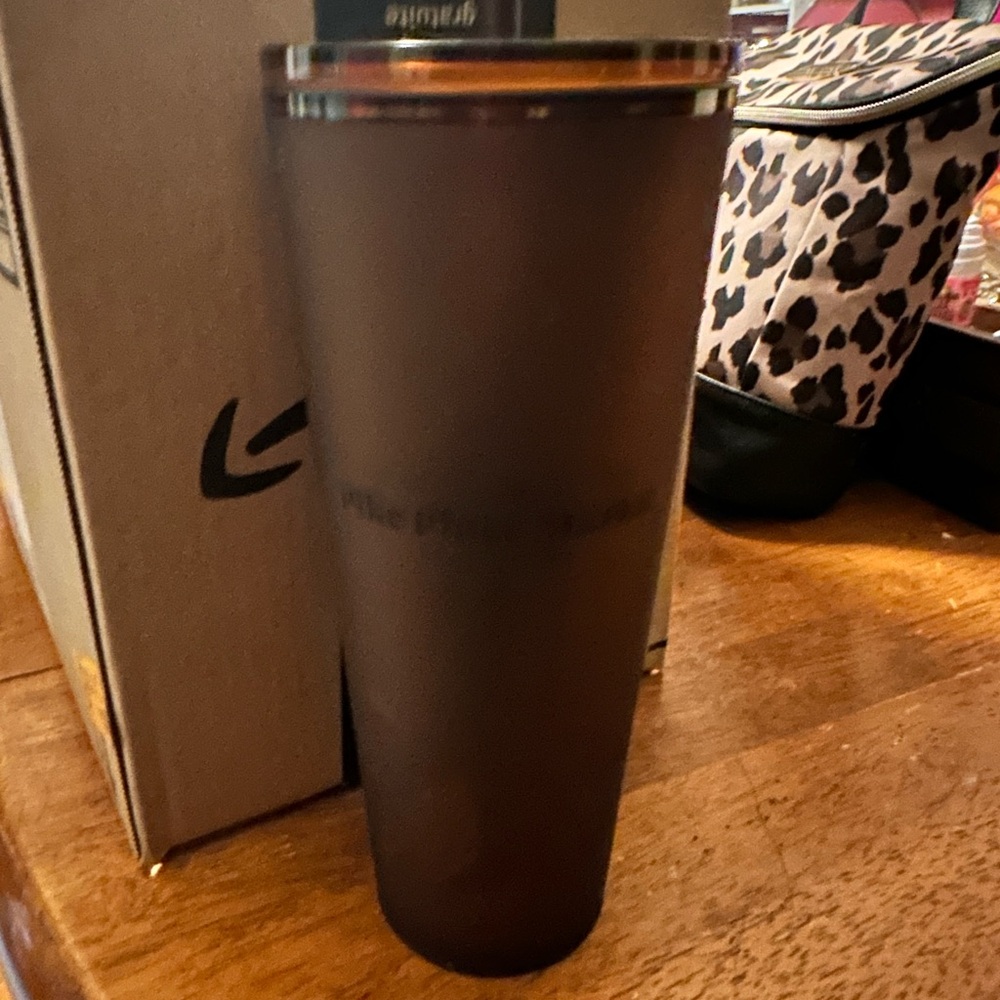 Starbucks tumbler.